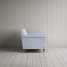 Side profile of the Idler seat in Aqua Brown ticking cotton by Nix.
