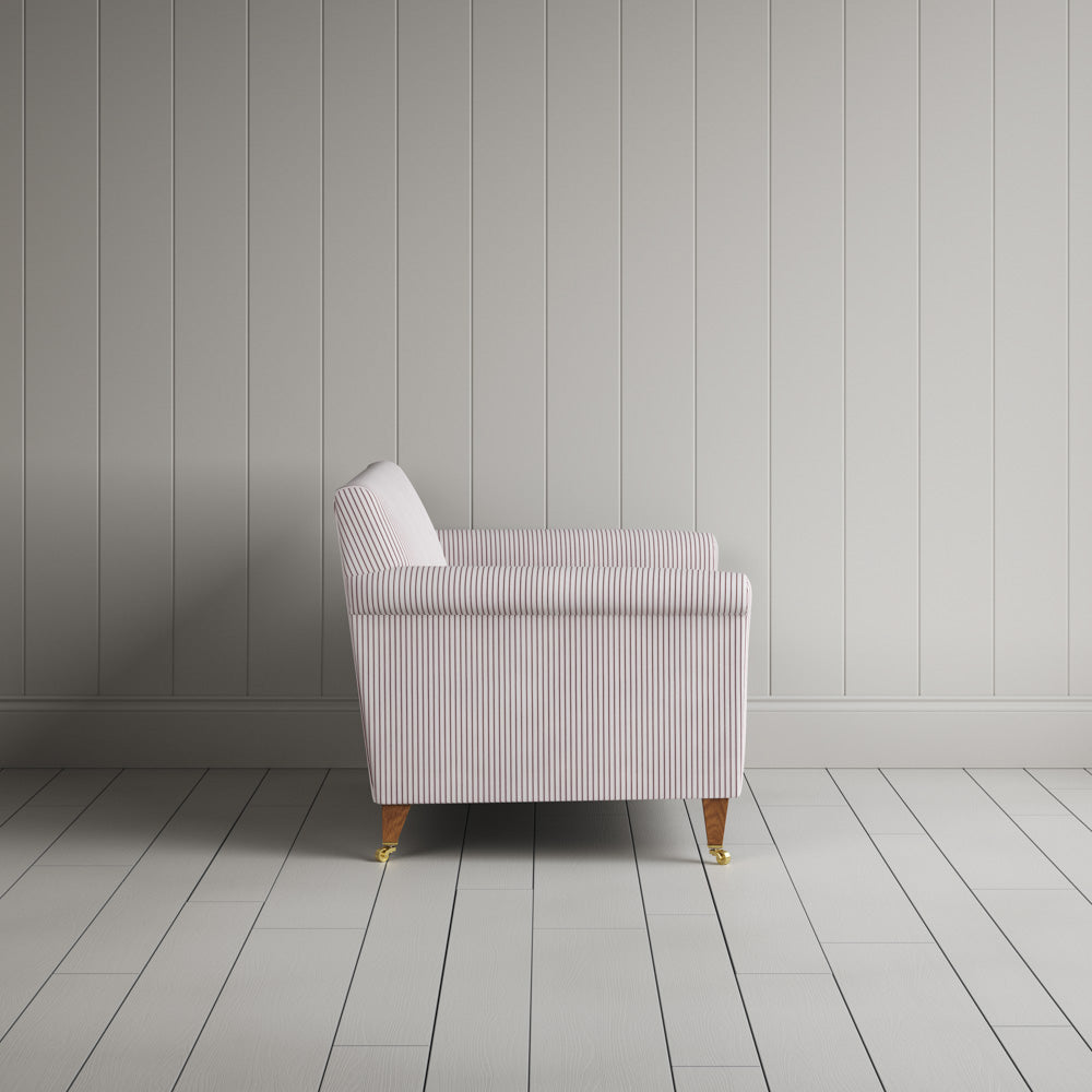 Side profile of the striped Idler love seat by Nicola Harding
