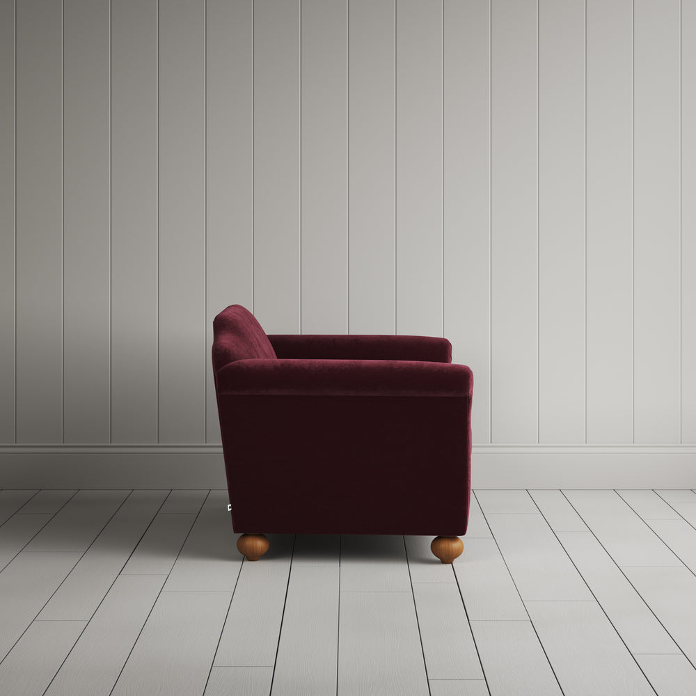  Side profile of the Cherry red corduroy Dolittle love seat 