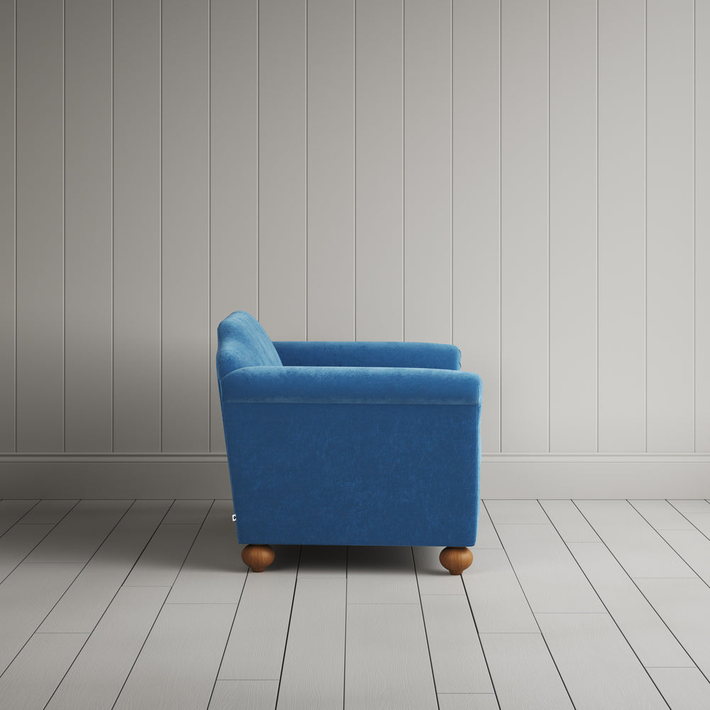 Side profile of the Harbour Blue corduroy Dolittle settee 