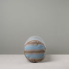  Side View of Bask Bolster Cushion in Regatta Cotton, Blue - Nicola Harding 