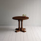 Small beautiful round Smoky Stained Oak Wood dining table, With plants manufactured by NiX in London.