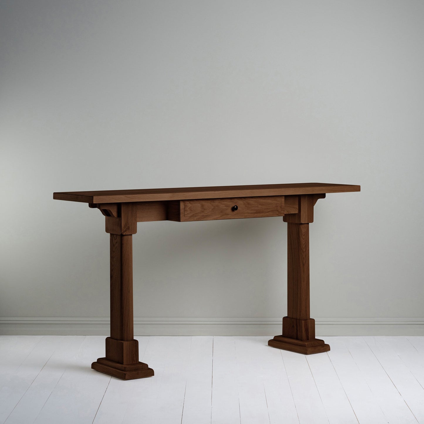 Keepsake Console Table in smoky stained oak with a storage drawer, designed by Nicola Harding & Co.