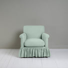  Front View of Curtain Call Armchair in Laidback Linen Sky - Nicola Harding 