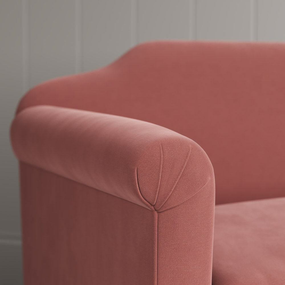 Macro detail of premium upholstery stitch lines on a Nicola Harding design love seat.