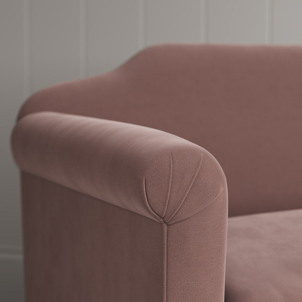 Close-up of the tailored scroll armrest on the Dolittle sofa by NiX.