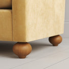 Playful spherical timber ball feet