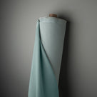  Blue fabric roll, perfect for crafting or sewing projects. 