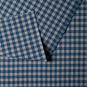  Close-up of the folded plaid cotton material used by Nix. 
