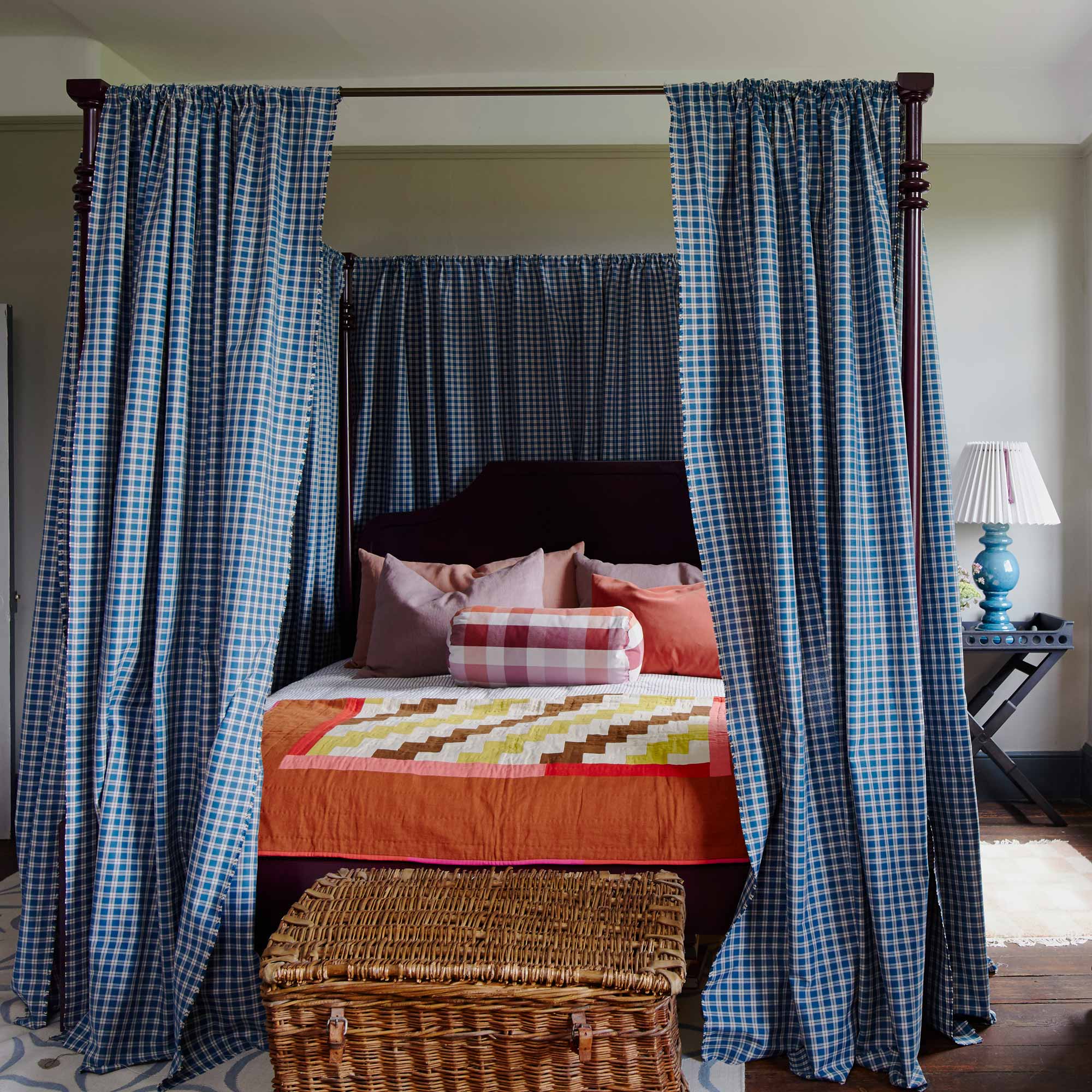  The Folly four-poster bed with bed curtains, mattress, pillows, side table with blue base lamp - NiX by Nicola Harding 