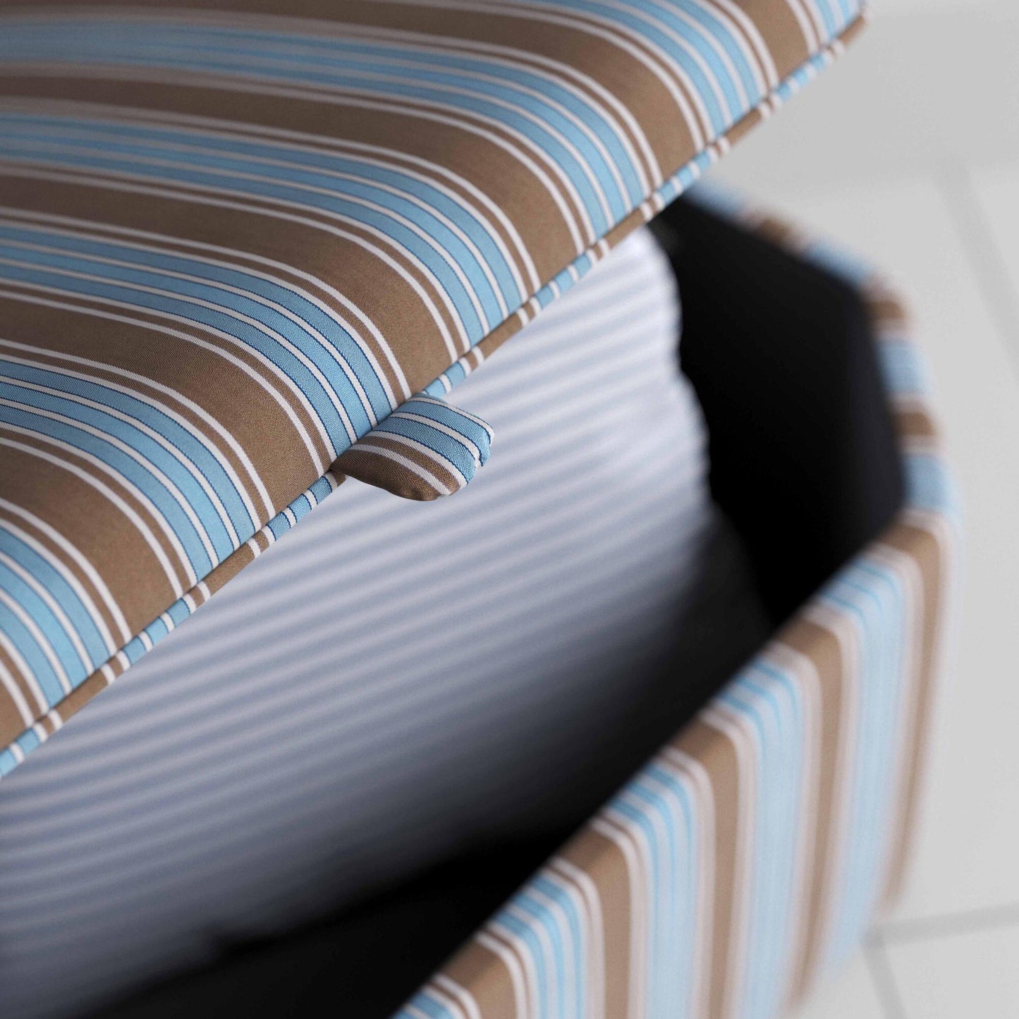 Open Lid Closeup of Storage Ottoman in Regatta Cotton, Blue - Nicola Harding