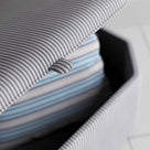  A close up of stylish grey ottoman. - NiX 