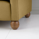  Closeup of Round Wooden Foot Design, of 4 seater sofa in Laidback Linen Ochre - By Nicola Harding & Co. 