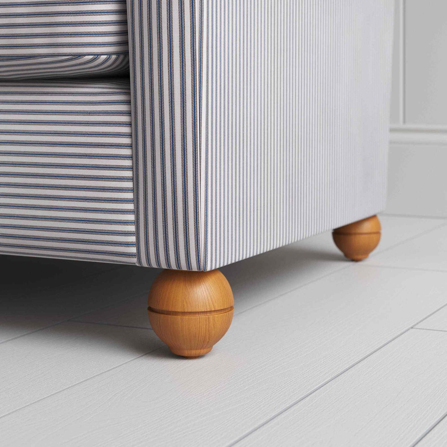 NiX Seating in Ticking Cotton, Blue Brown, With Round Wooden Foot Closeup - By NiX