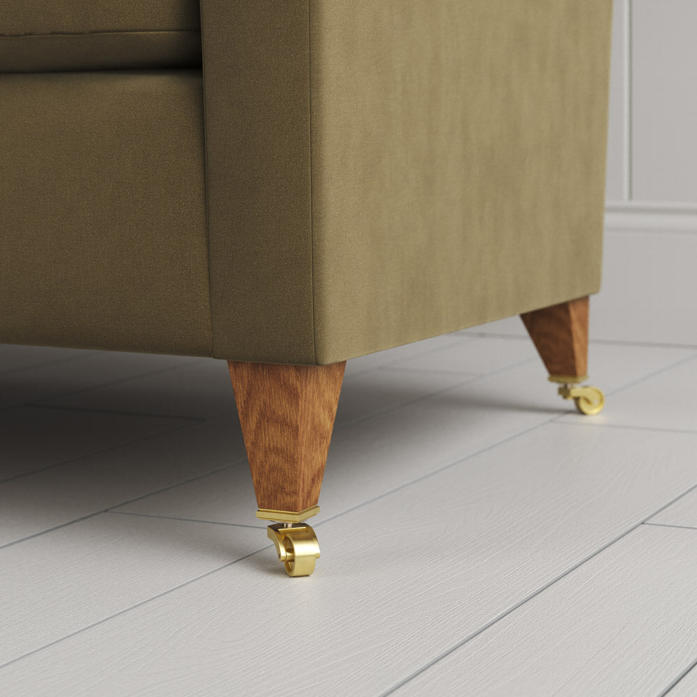  Tapered feet and castors on the Sepia velvet Idler seat by Nix. 