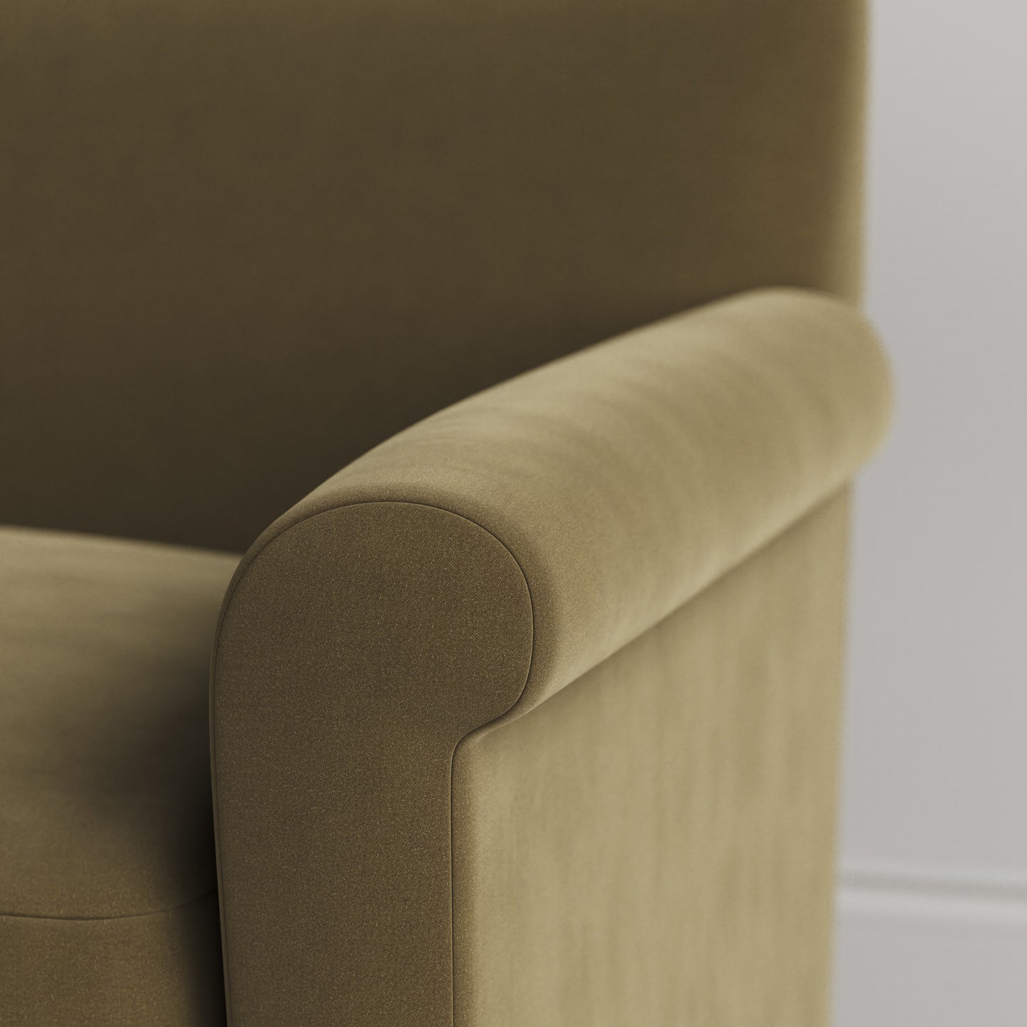 Close-up of the tailored armrest on the Sepia velvet Idler by Nix.