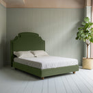  Seventh Heaven Upholstered Bed in Intelligent Velvet Juniper without Valance complete bed picture with an indoor plant on the left. 