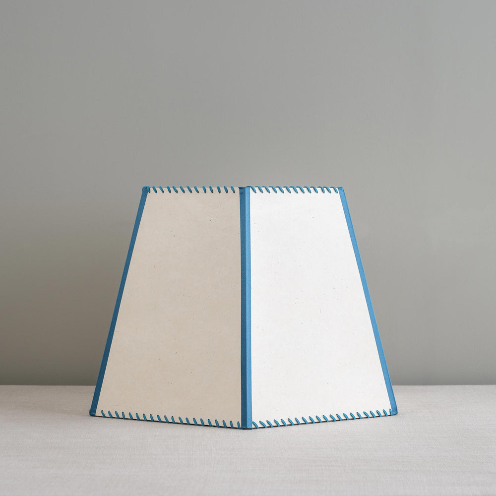 image of Townhouse Hexagonal Lamp Shade in Soft White with Peacock Blue Trim & Stitching