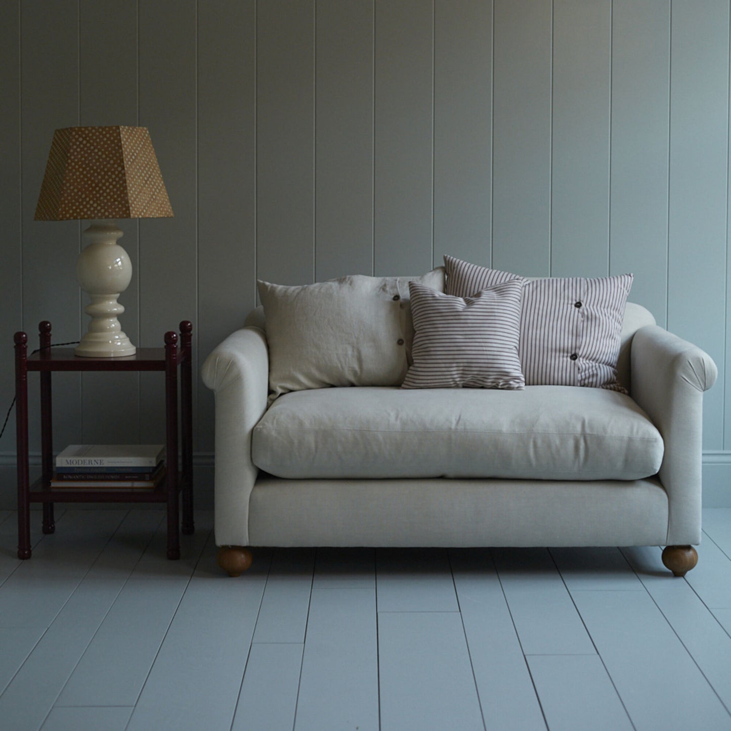 Dolittle Big Love Seat styled with NiX special cushions, lifestyle use in a room setting by Nicola Harding.