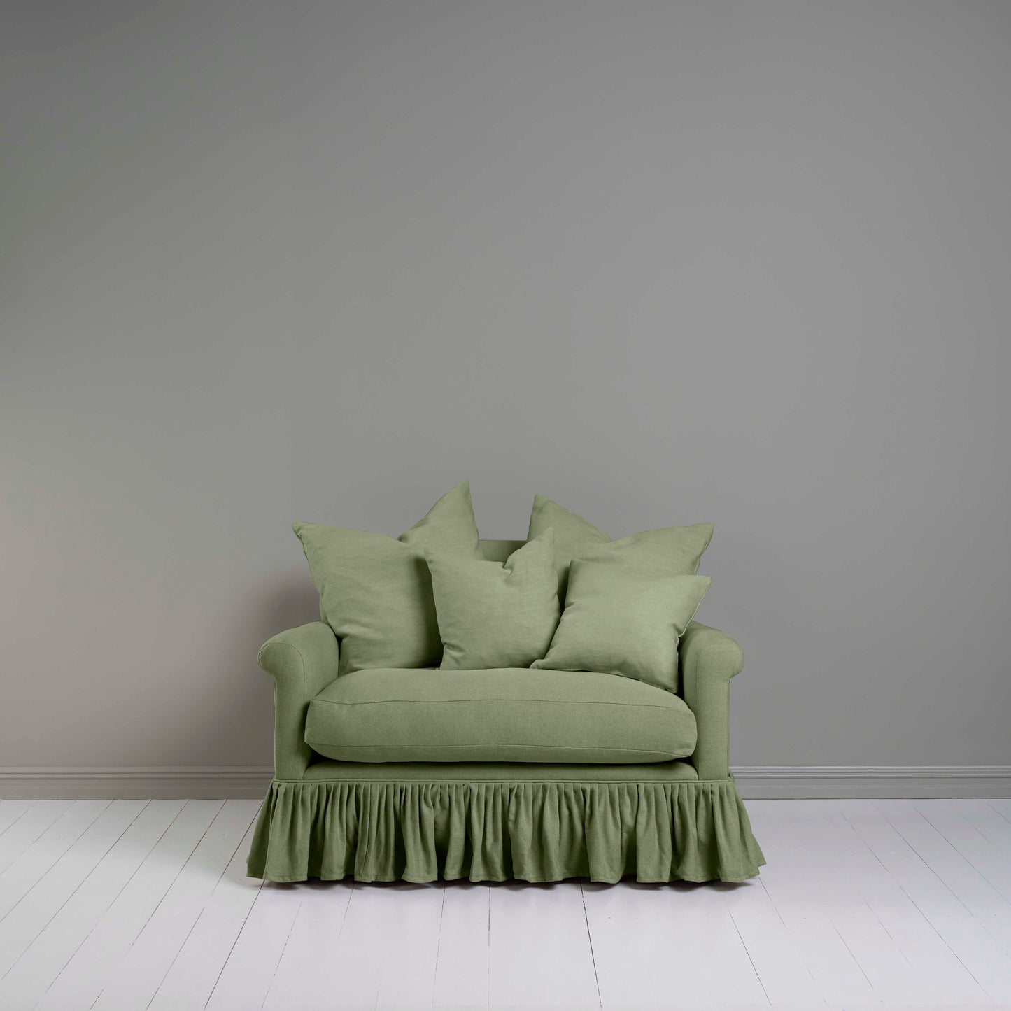 Front View of Curtain Call Love Seat in Green(Moss) With Cushions - NiX By Nicola Harding