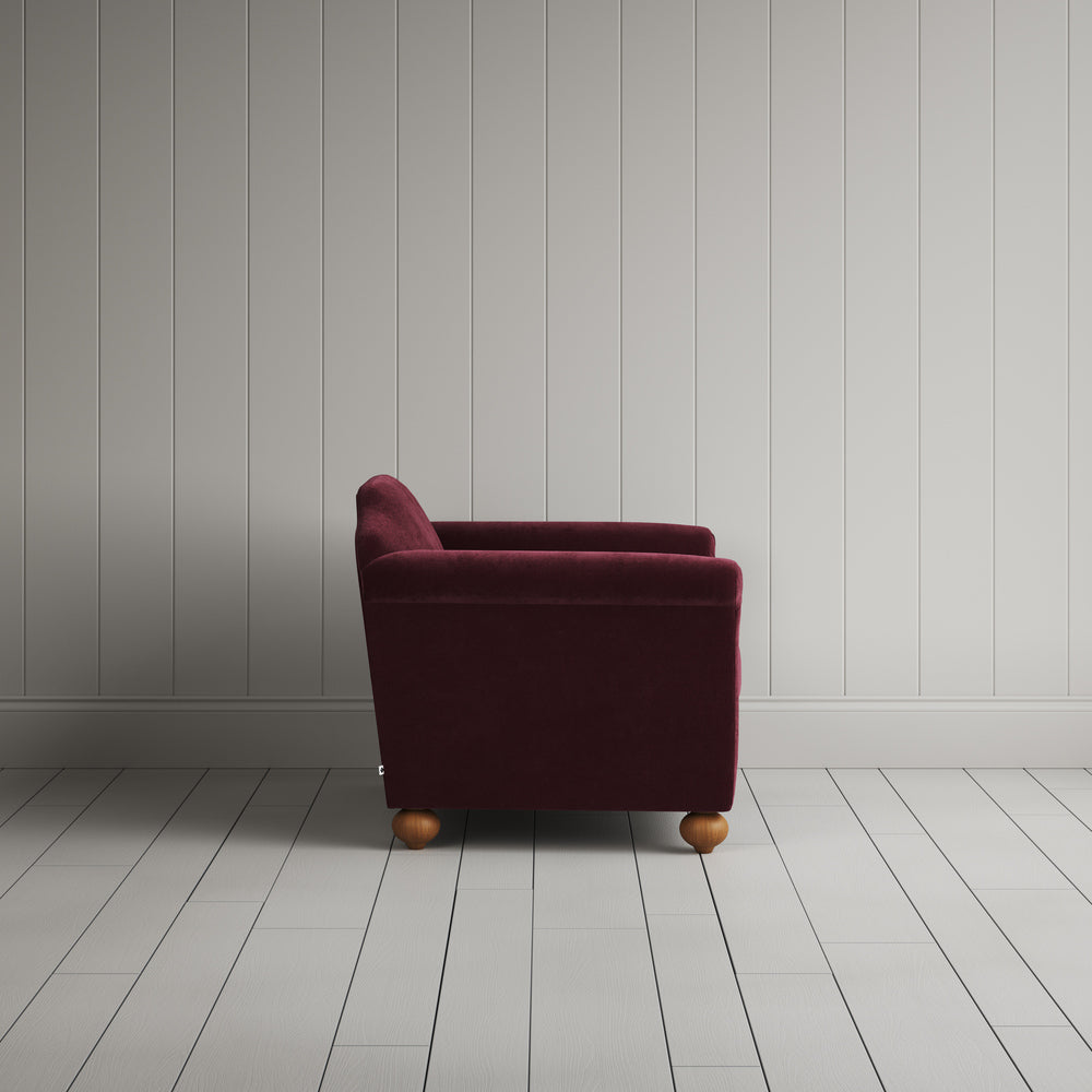  Side profile of the Cherry red corduroy Dolittle love seat 