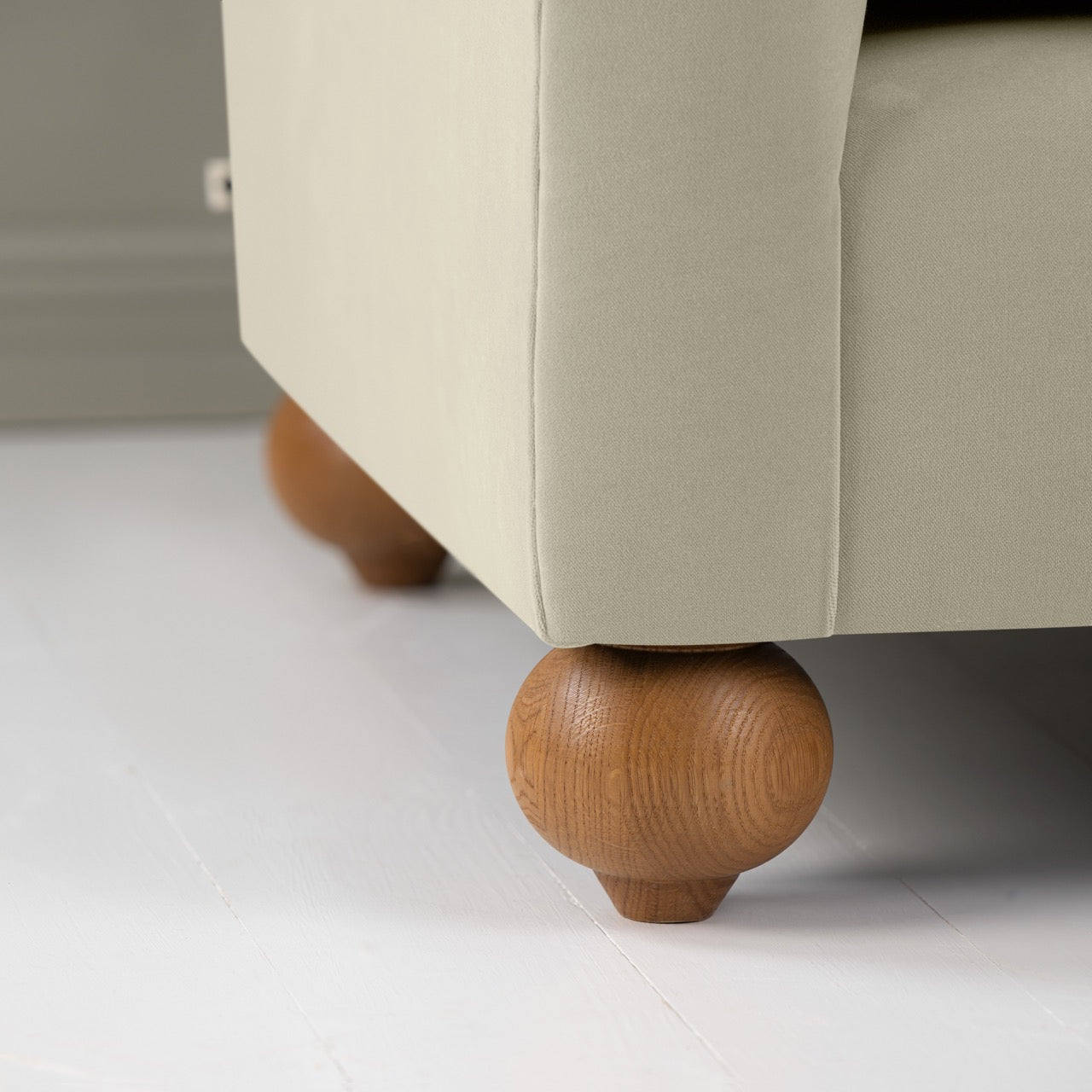  Dolittle Love Seat in Intelligent Velvet Moonstone, With Round Wooden Foot Closeup - Nicola Harding 