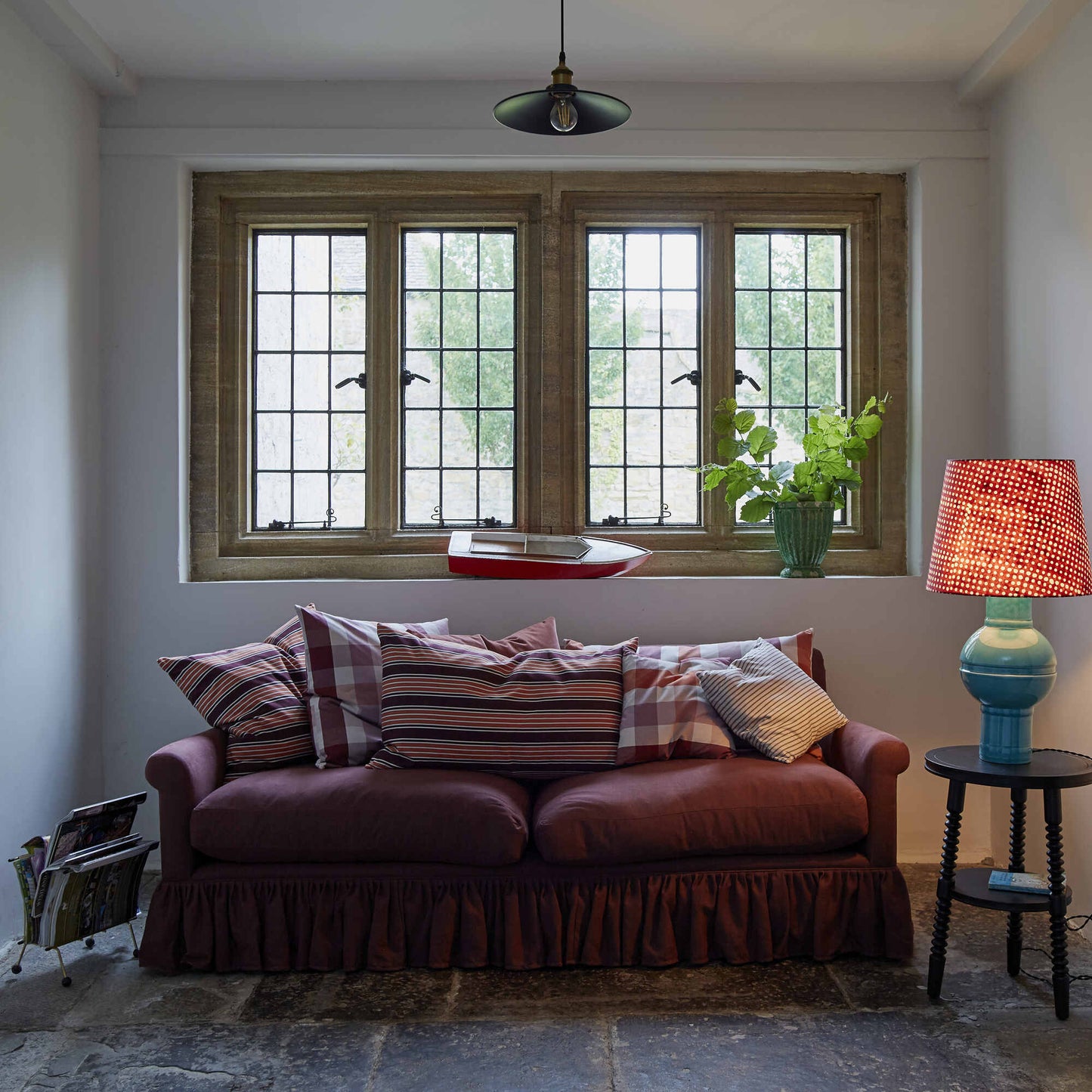 Curtain Call 4 Seater Sofa With NiX Square & Rectangle Cushions, and a Side Table With a Blue Base Lamp - NiX