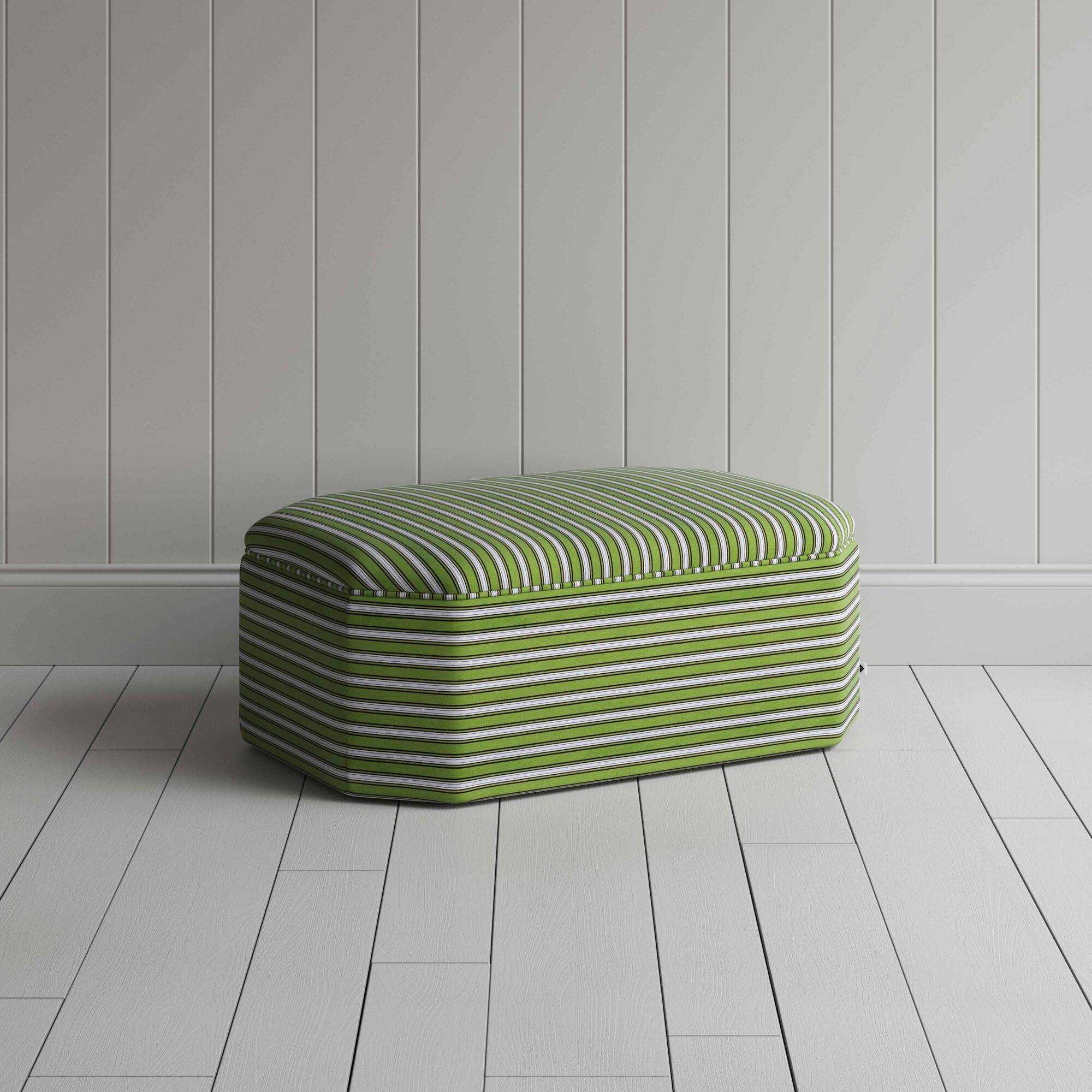  Green and white striped ottoman, perfect for adding a pop of color to any room decor. 