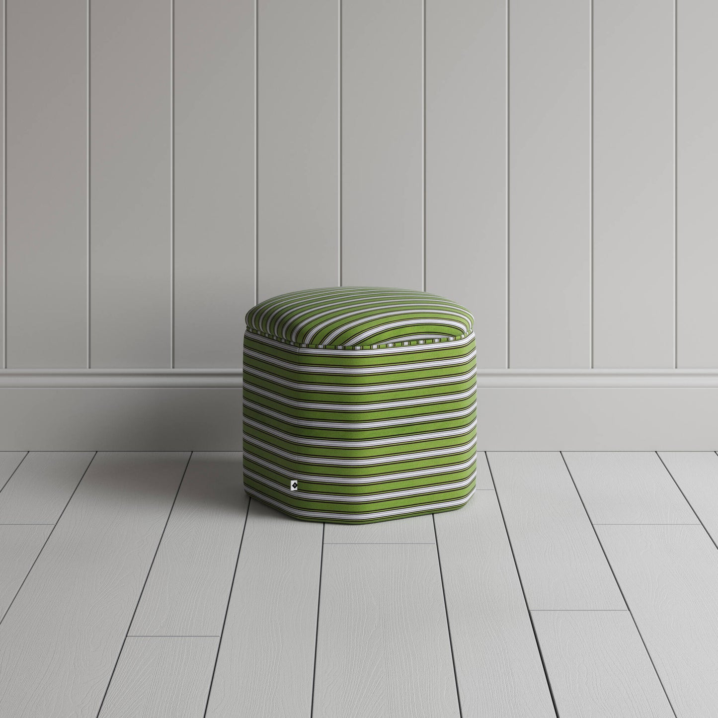 Showcasing a white and green stripped ottoman.