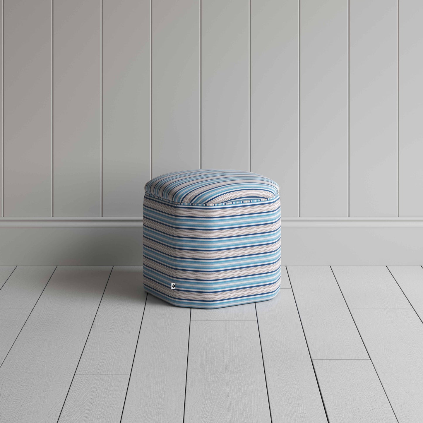 Small ottoman with blue and white stripes, ideal for a stylish and cozy seating option.