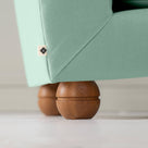  Perch Slipper Armchair in Intelligent Velvet Sea Mist. Back Side Round Wooden Foot Closeup With NiX Special tag 