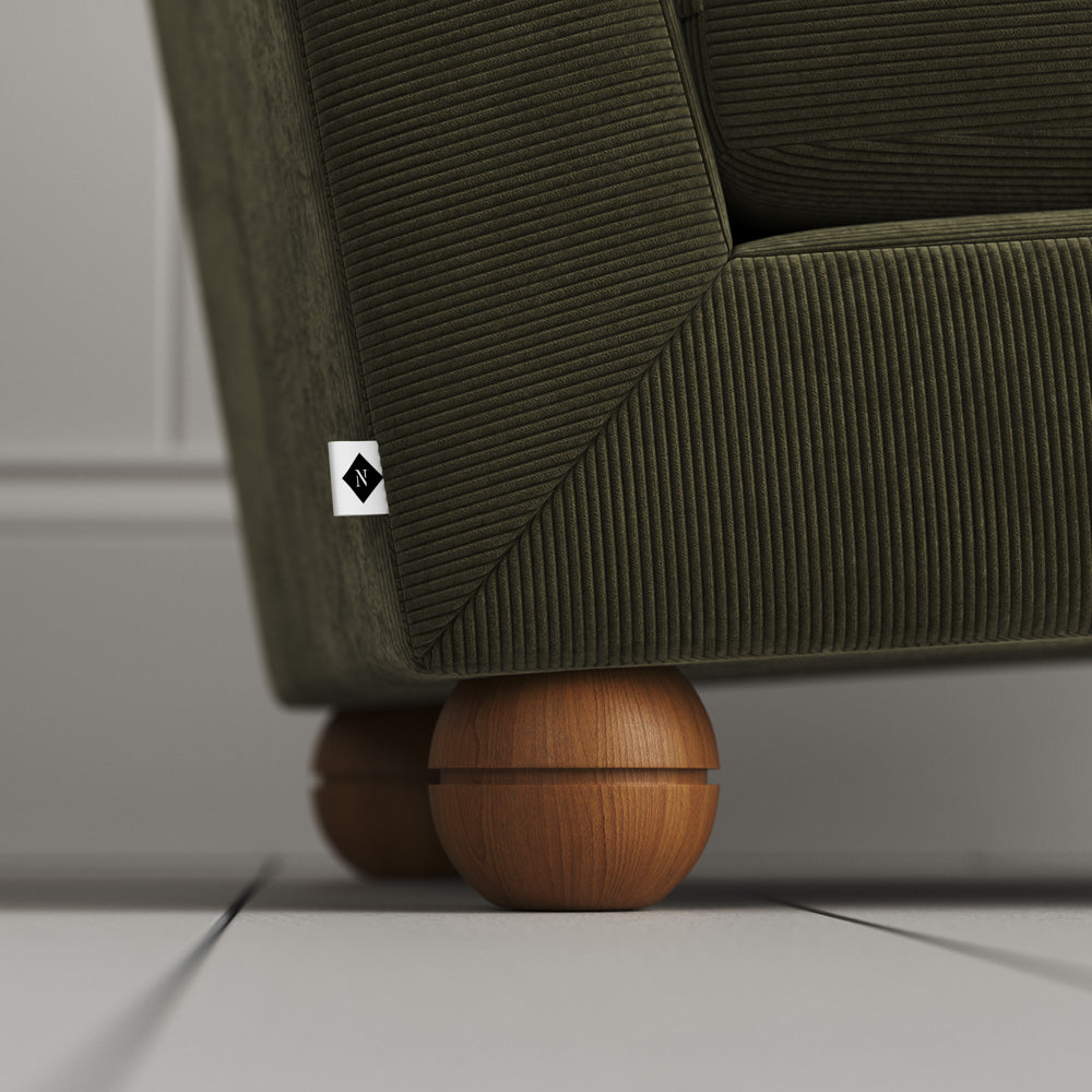  Perch Armchair close-up detail of the playful spherical timber foot by NiX. 