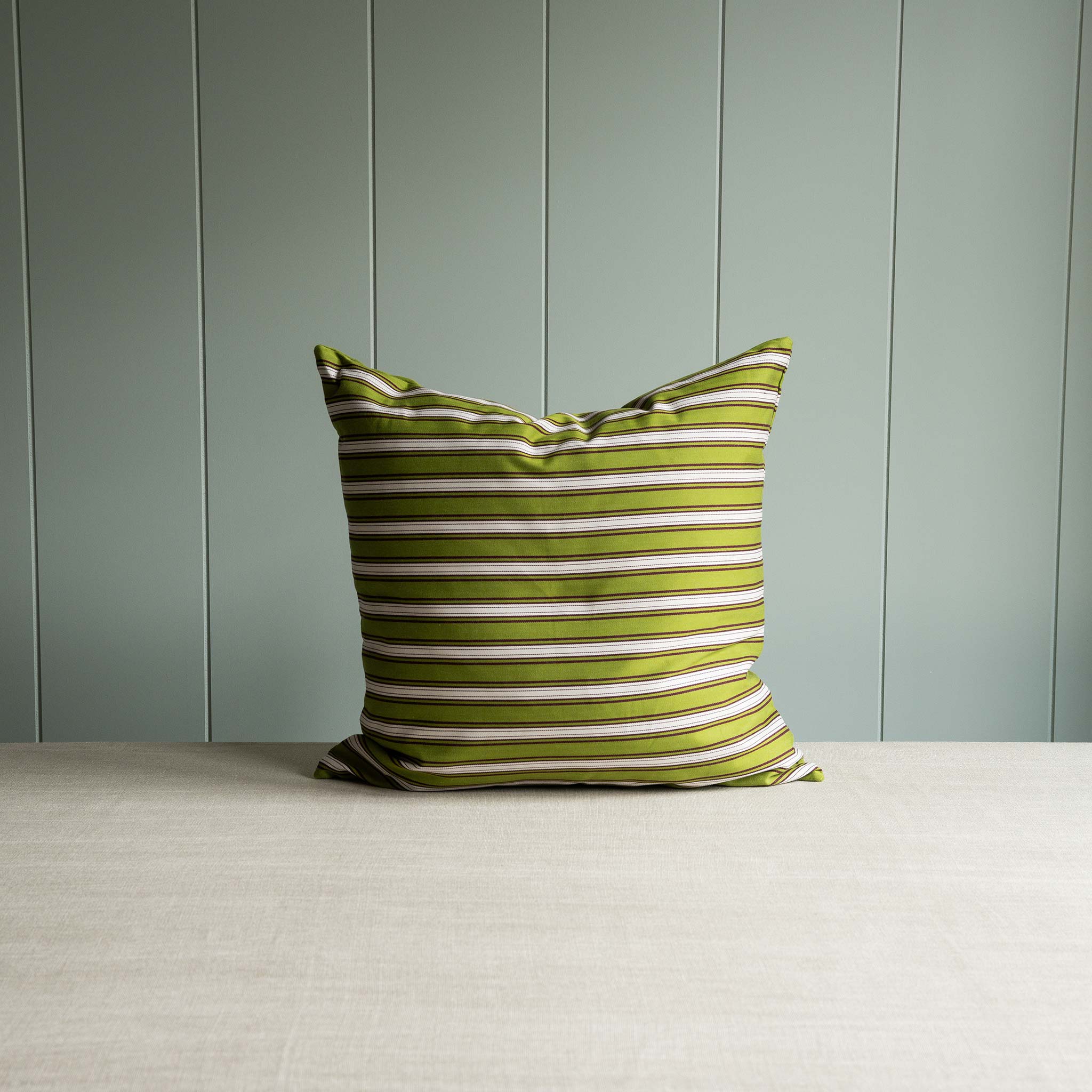  A pillow with green and white stripes 