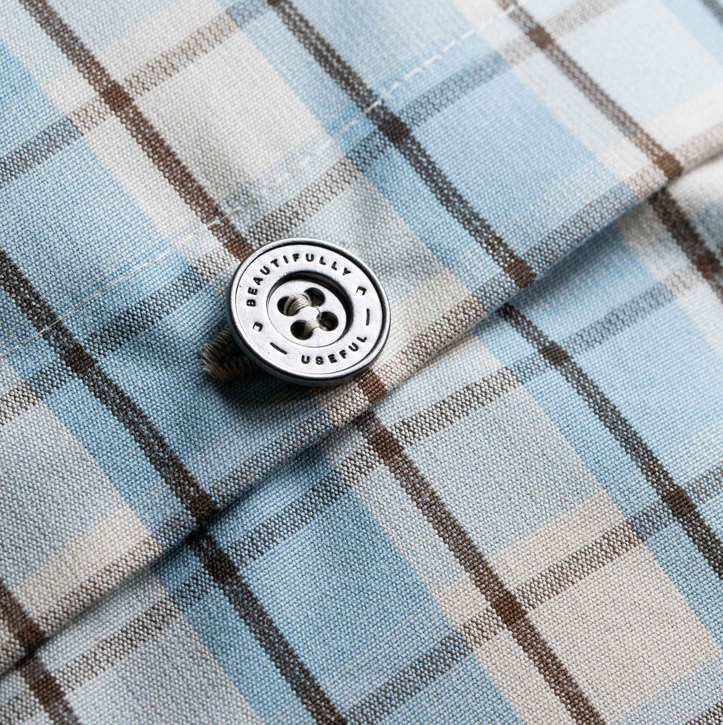 Blue and white checkered shirt, perfect for a casual day out.