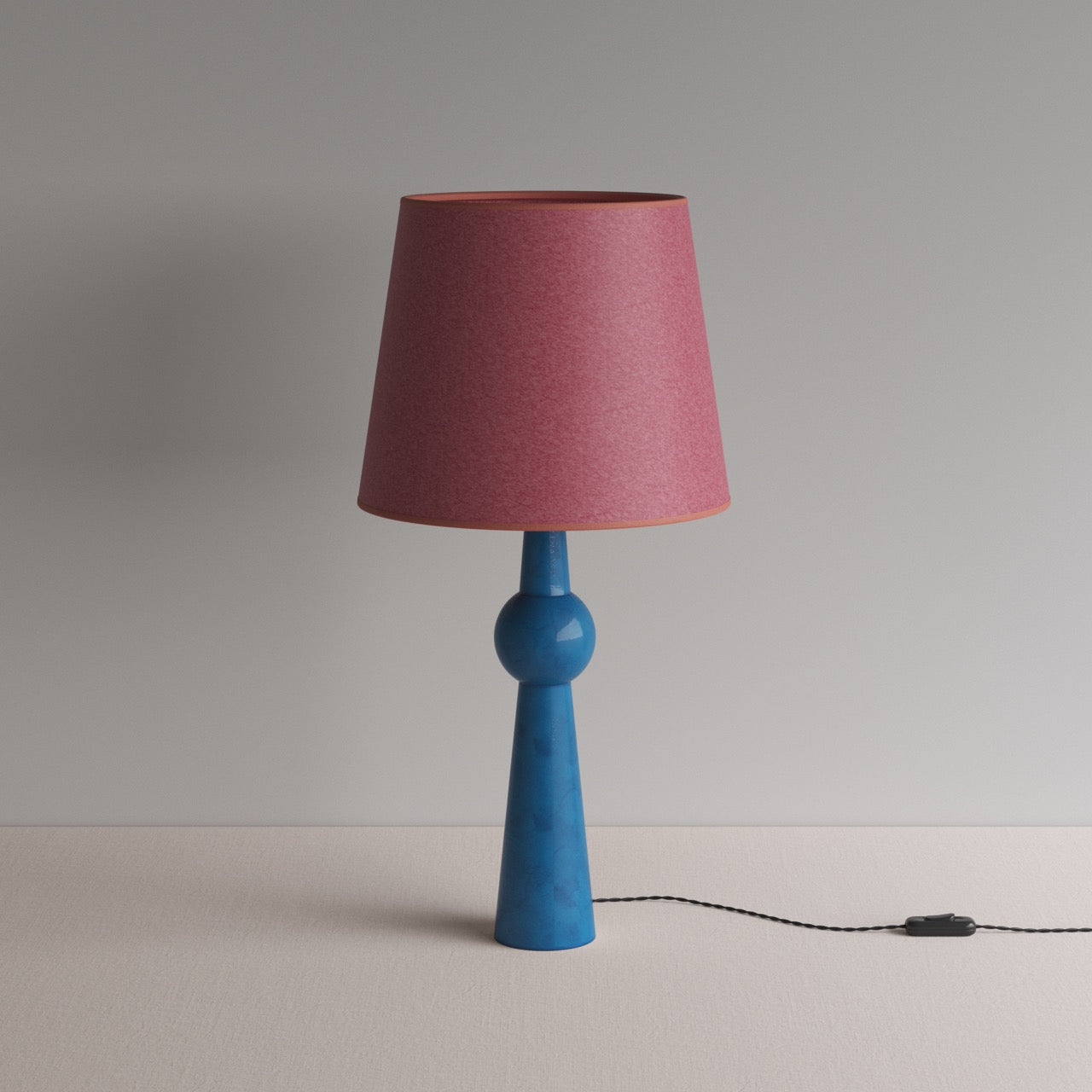 Comet Ceramic Table Lamp Base in Blue, With Humbug Straight Empire Paper Lampshade in Burgundy Paper with Pink Trim - By NiX