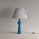  Comet Ceramic Table Lamp Base in Blue, With Sunburst Concertina Natural Pleat Lamp Shade with Peacock Blue Cord - Nicola Harding 