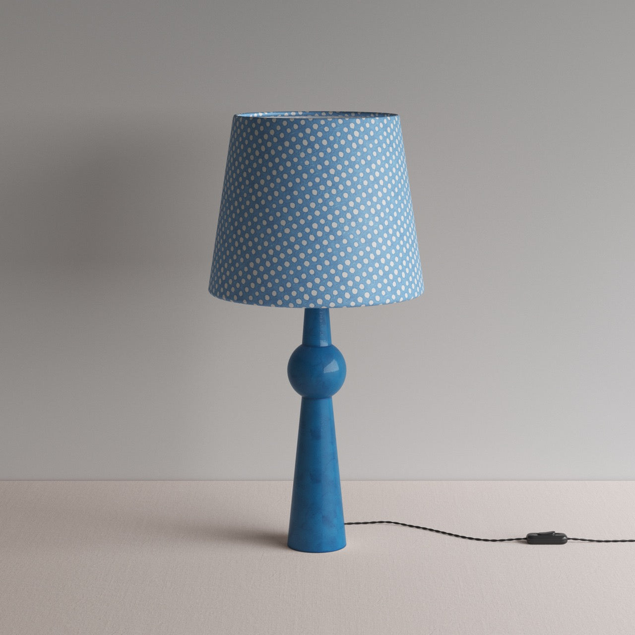 Comet Ceramic Table Lamp Base in Blue, With Humbug Straight Empire Batik Paper Lamp Shade in Dotty Sky Blue - Nicola Harding