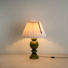  Hourglass Ceramic Table Lamp Base in Green, With Sunburst Concertina Natural Pleat Lamp Shade with Blackberry Cord With Lights 'ON' - Nicola Harding 
