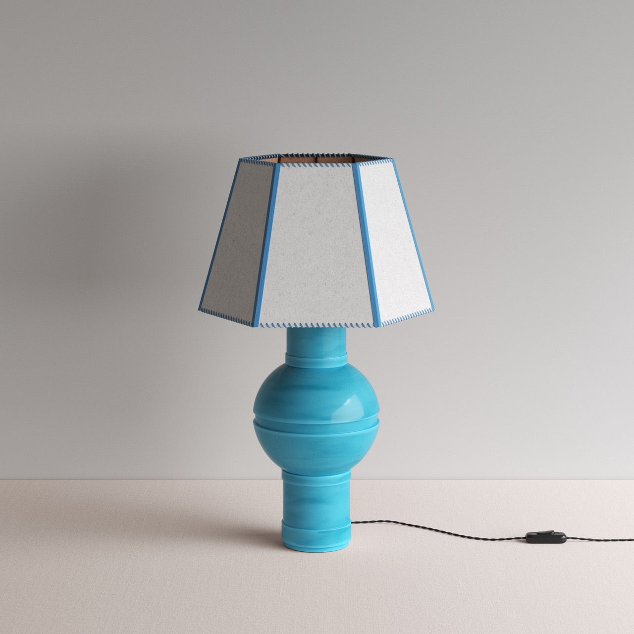 Orb Ceramic Table Lamp Base in Turquoise, With Townhouse Hexagonal Lamp Shade in Soft White with Peacock Blue Trim & Stitching - Nicola Harding