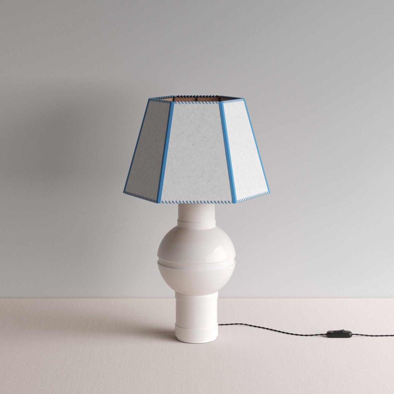  Orb Ceramic Table Lamp Base in Warm White, With Townhouse Hexagonal Lamp Shade in Soft White with Peacock Blue Trim & Stitching - By NiX 