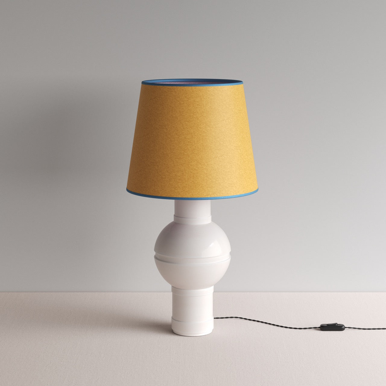  Orb Ceramic Table Lamp Base in Warm White, With Humbug Straight Empire Paper Lamp Shade in Mustard with Blue Trim - By NiX 