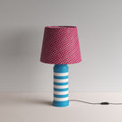  Humbug Striped Ceramic Table Lamp Base in Blue & Warm White, With Humbug Straight Empire Batik Paper Lamp Shade in Dotty Maroon - By NiX 