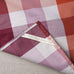 image of Luster Tea Towel in Checkmate Cotton, Berry