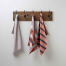  3 Tea Towels hanging from the hook - Nicola Harding 