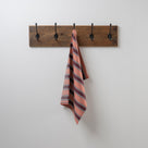  Luster Tea Towel in Regatta Cotton, Flame hanging from hook - Nicola Harding 