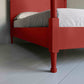 Out for the Count Three Quarter Poster Bed in Ruby Red Legs Closeup - NiX