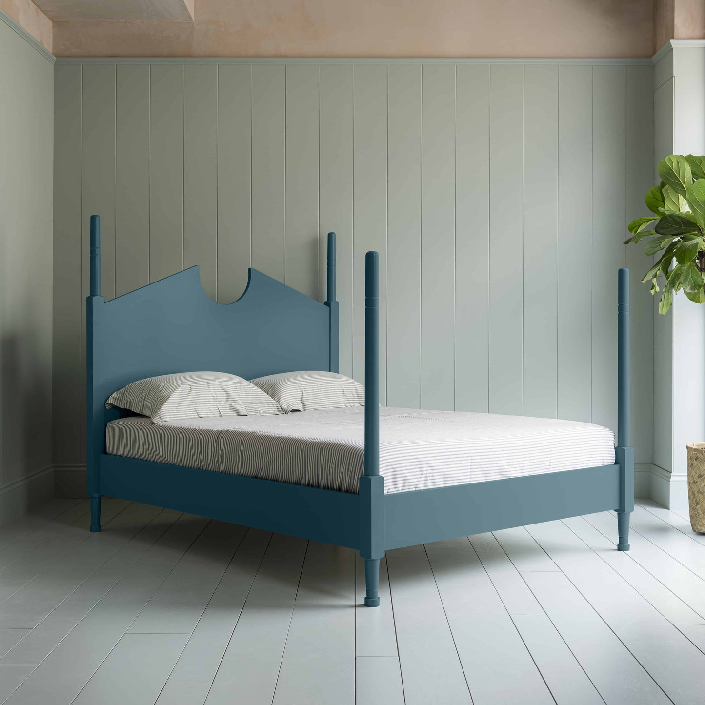 Out for the Count Three Quarter Poster Bed in Marine Blue Side View With In Door Plant - By NiX