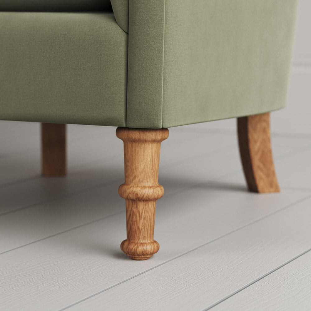 Time Out Armchair close-up detail of the turned timber front legs by NiX.