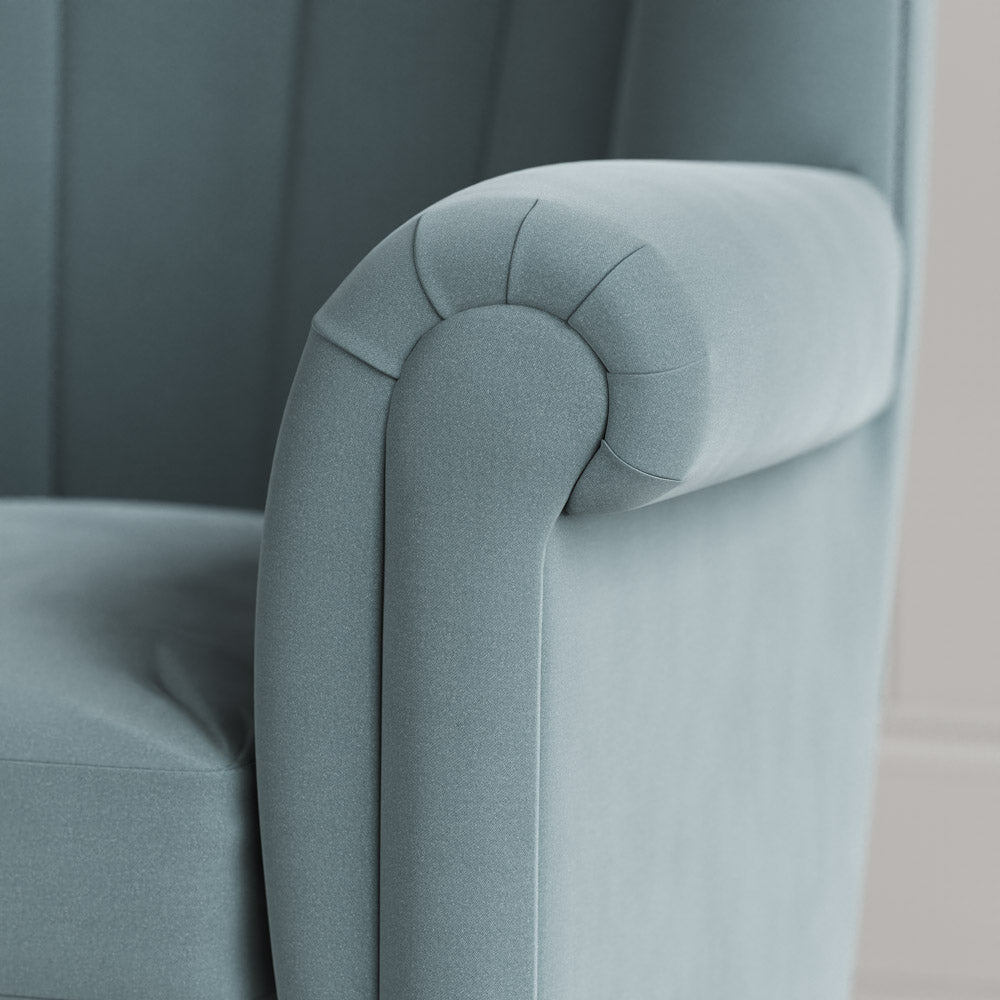 NiX design intelligent velvet fabric upholstered armchair arm detail shot. 