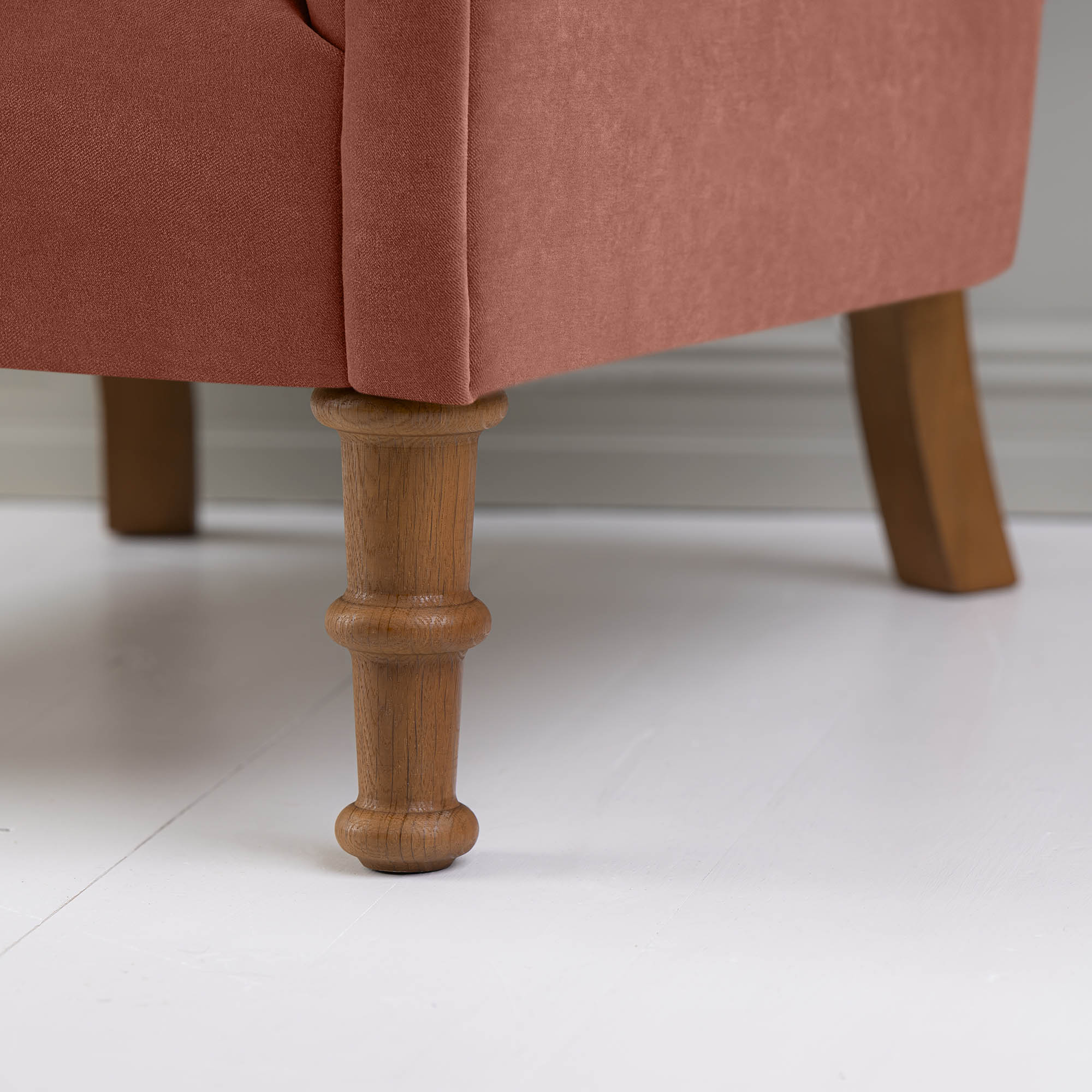  Time Out Armchair in Intelligent Velvet Sienna, Front Foot Handcrafted Design Closeup - NiX 